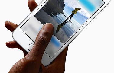 iPhone 6s in hand
