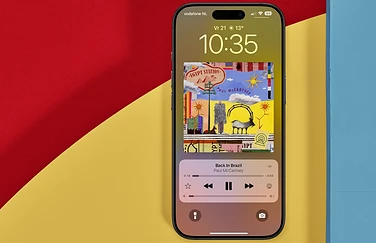 Muziek en podcasts: cover fullscreen op lock screen tonen