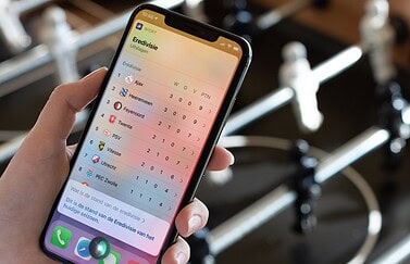 Siri met voetbal vragen.