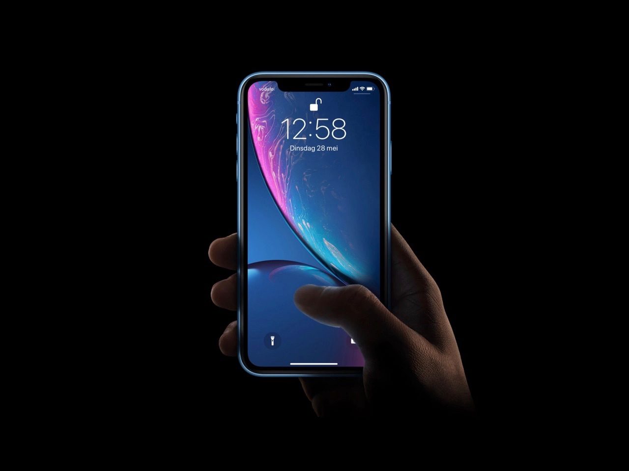 iPhone XR met toegangsscherm en Haptic Touch.