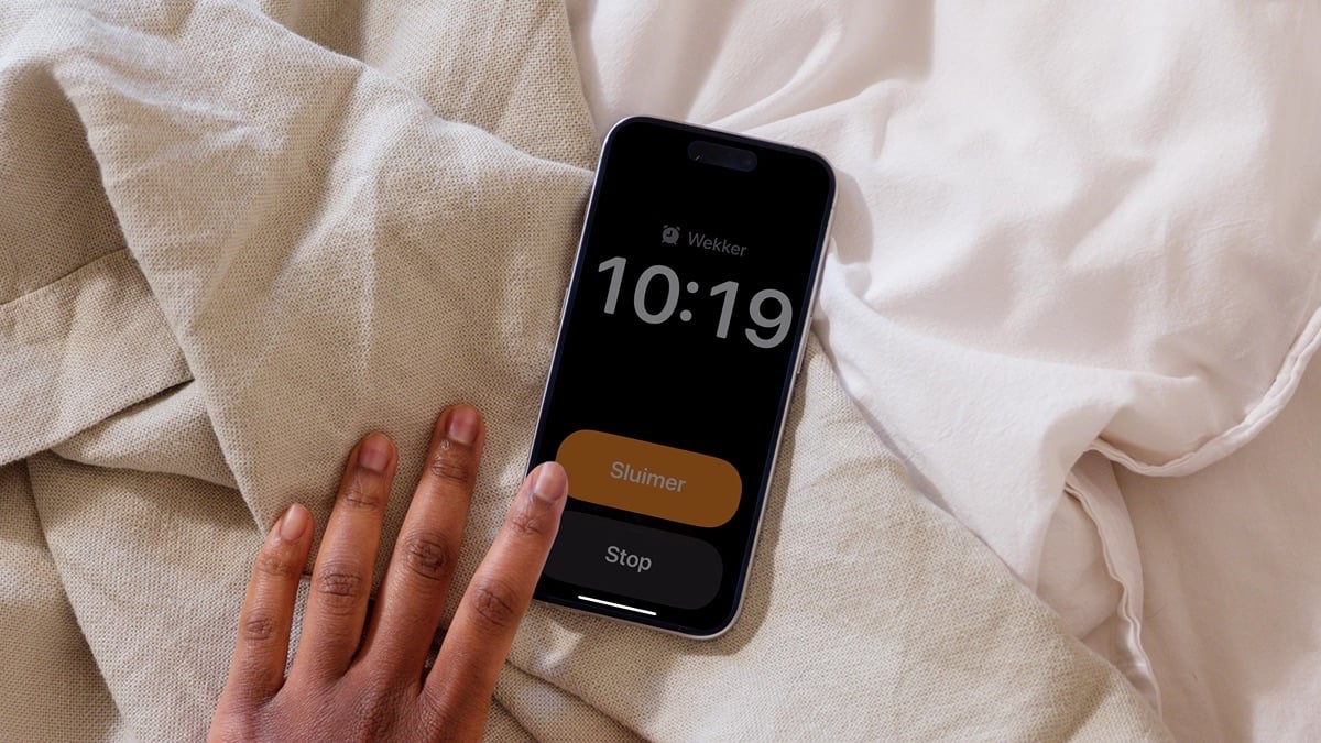 iOS 26 wekker met Snooze- en Stop-knop