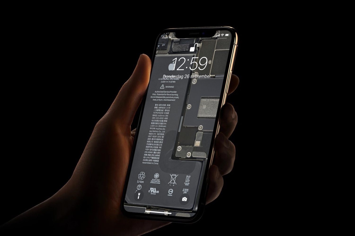 iFixit Wallpaper iPhone 11 Pro met binnenkant.