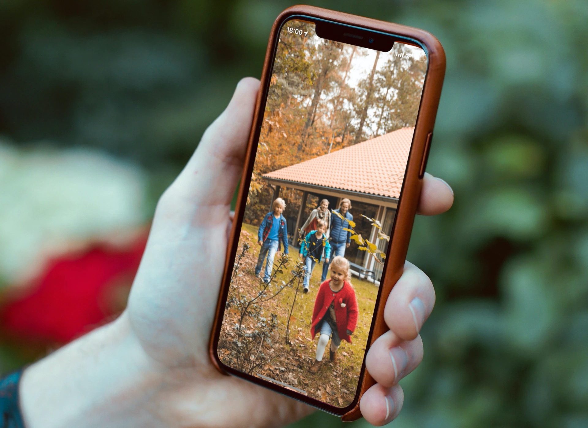 iPhone met een gezin op vakantiepark.
