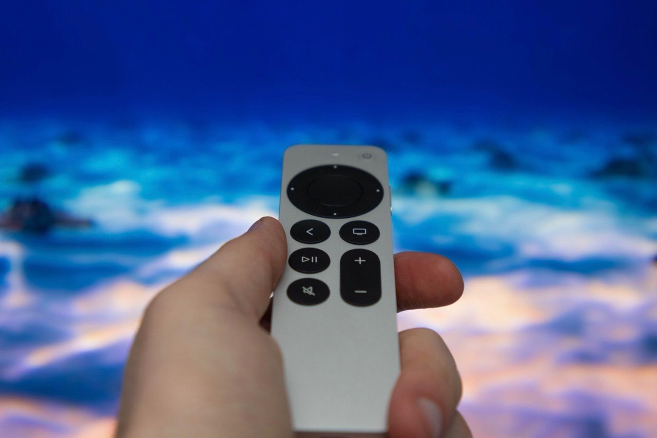 Siri Remote in hand 2