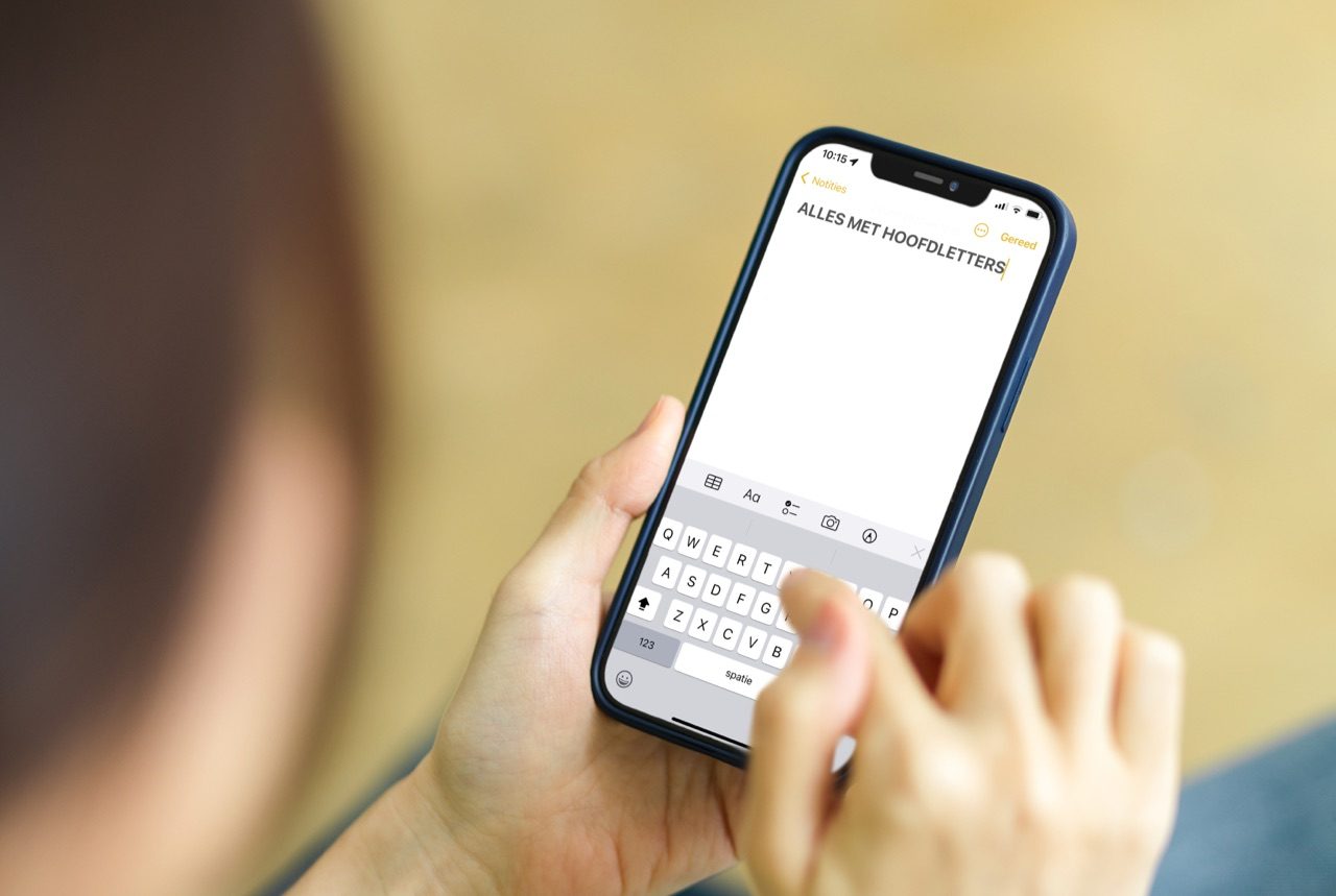 Hoofdletters op de iPhone typen
