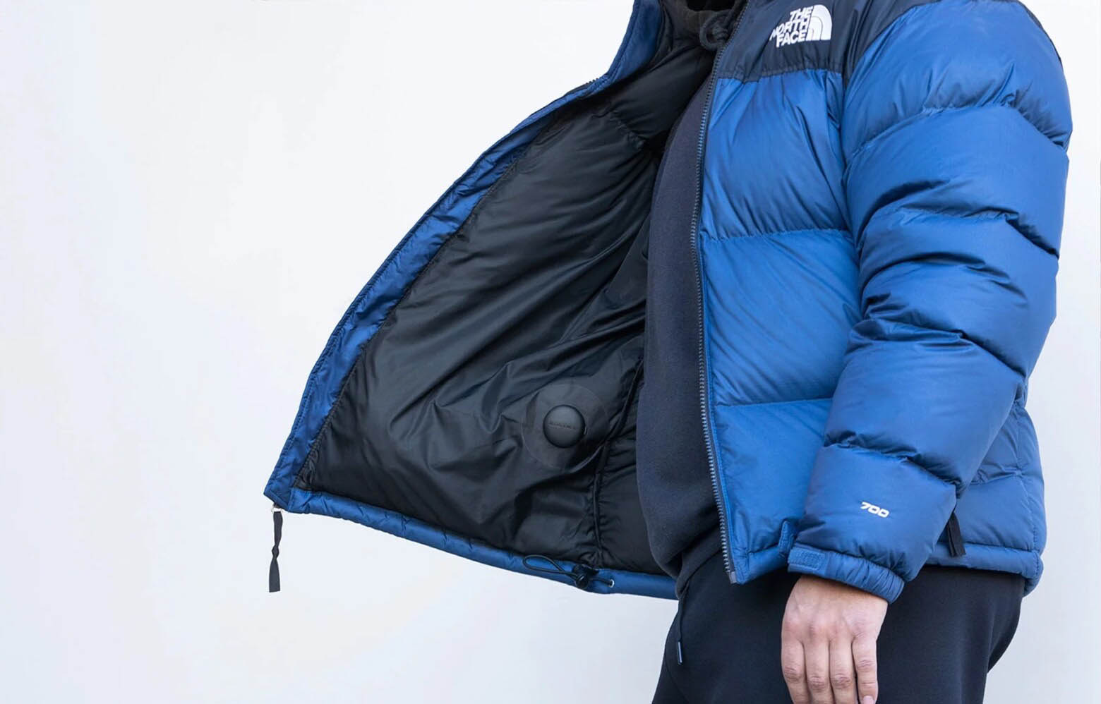 TagVault Fabric in een North Face jas